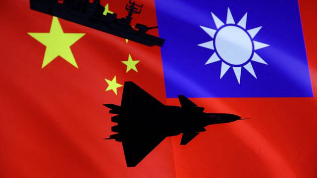 FILE PHOTO: Illustration shows aircraft carriers and airplane, Chinese and Taiwanese flags