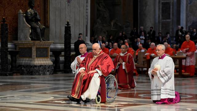 Pope Francis presides over the Good Friday Passion of the Lord service in Saint Peter's Basilica at the Vatican