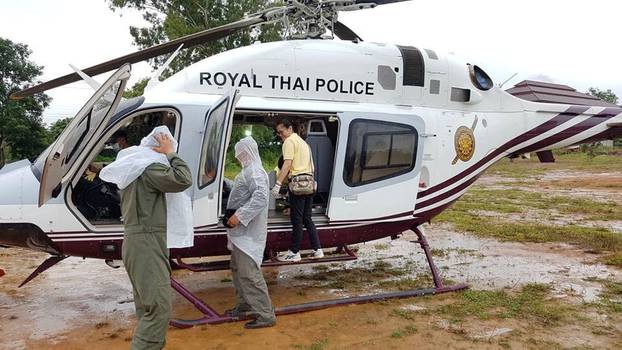 Rescue personnel prepare the transport for the evacuation of the boys and their soccer coach trapped in a flooded cave, in the northern province of Chiang Rai