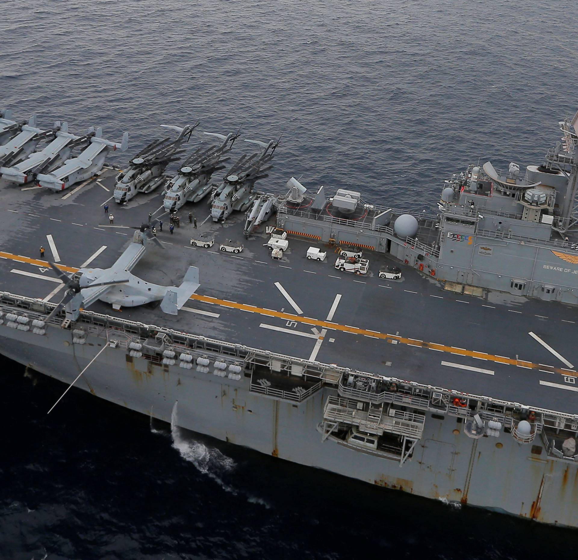 U.S. Marines MV-22 Osprey Aircraft sit on the deck of the USS Bonhomme Richard amphibious assault ship off the coast of Sydney