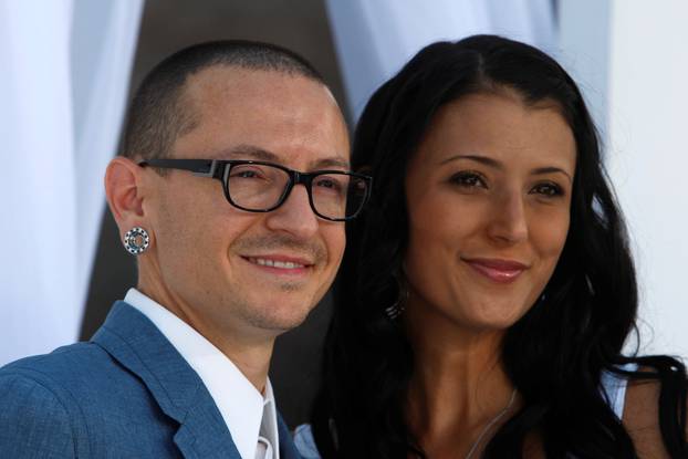 FILE PHOTO: Chester Bennington of Linkin Park and wife Talinda arrive at the 2012 Billboard Music Awards in Las Vegas