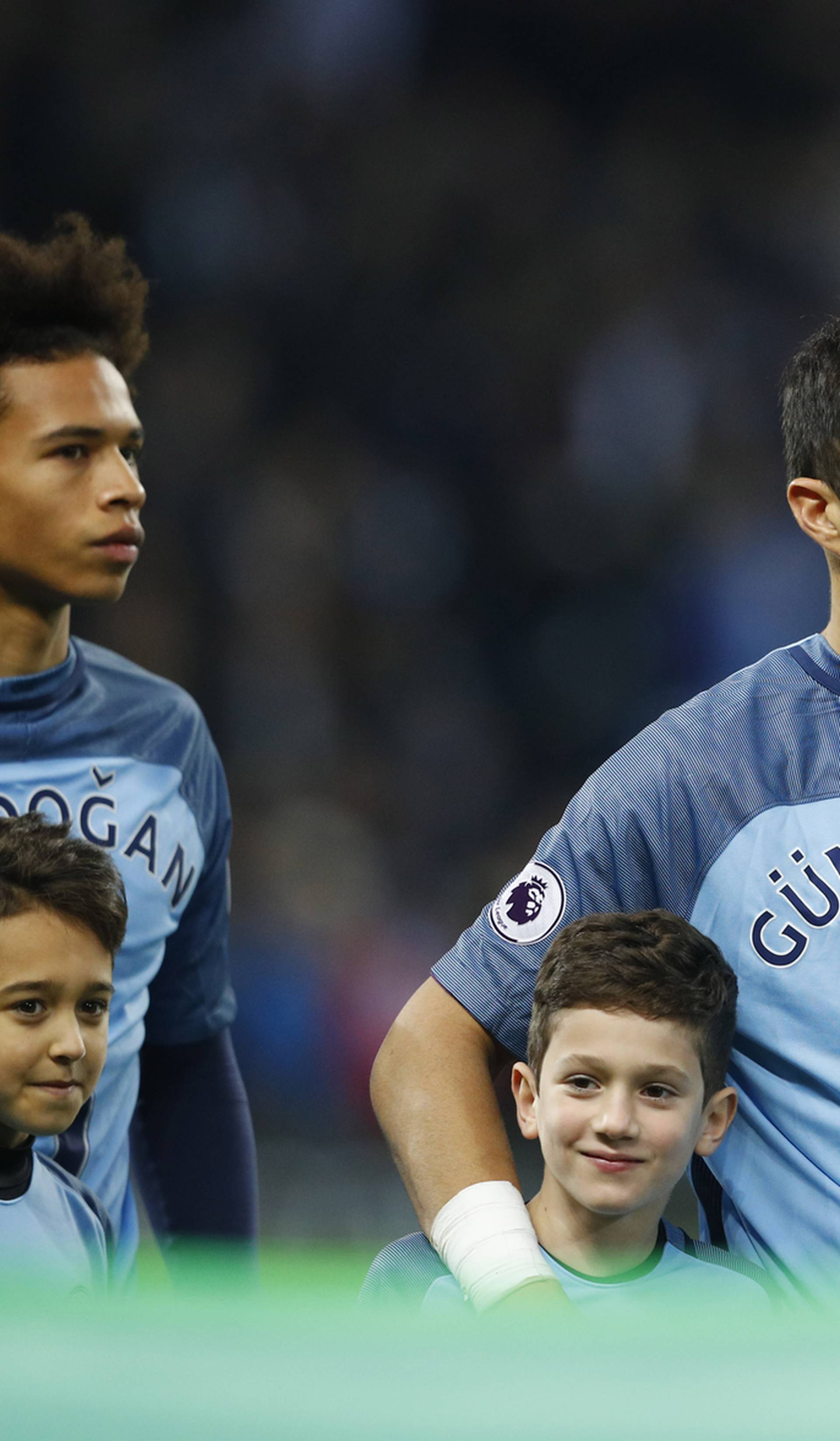 Manchester City's Claudio Bravo wears a shirt in support of injured team mate Ilkay Gundogan before the match