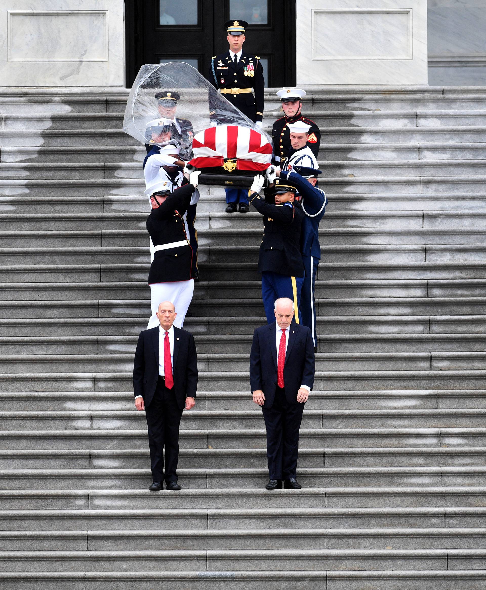 The casket of Senator John McCain, R-Ariz., is carried down the steps of the U.S. Capitol in Washington D.C. on Saturday, Sept. 01, 2018, in Washington