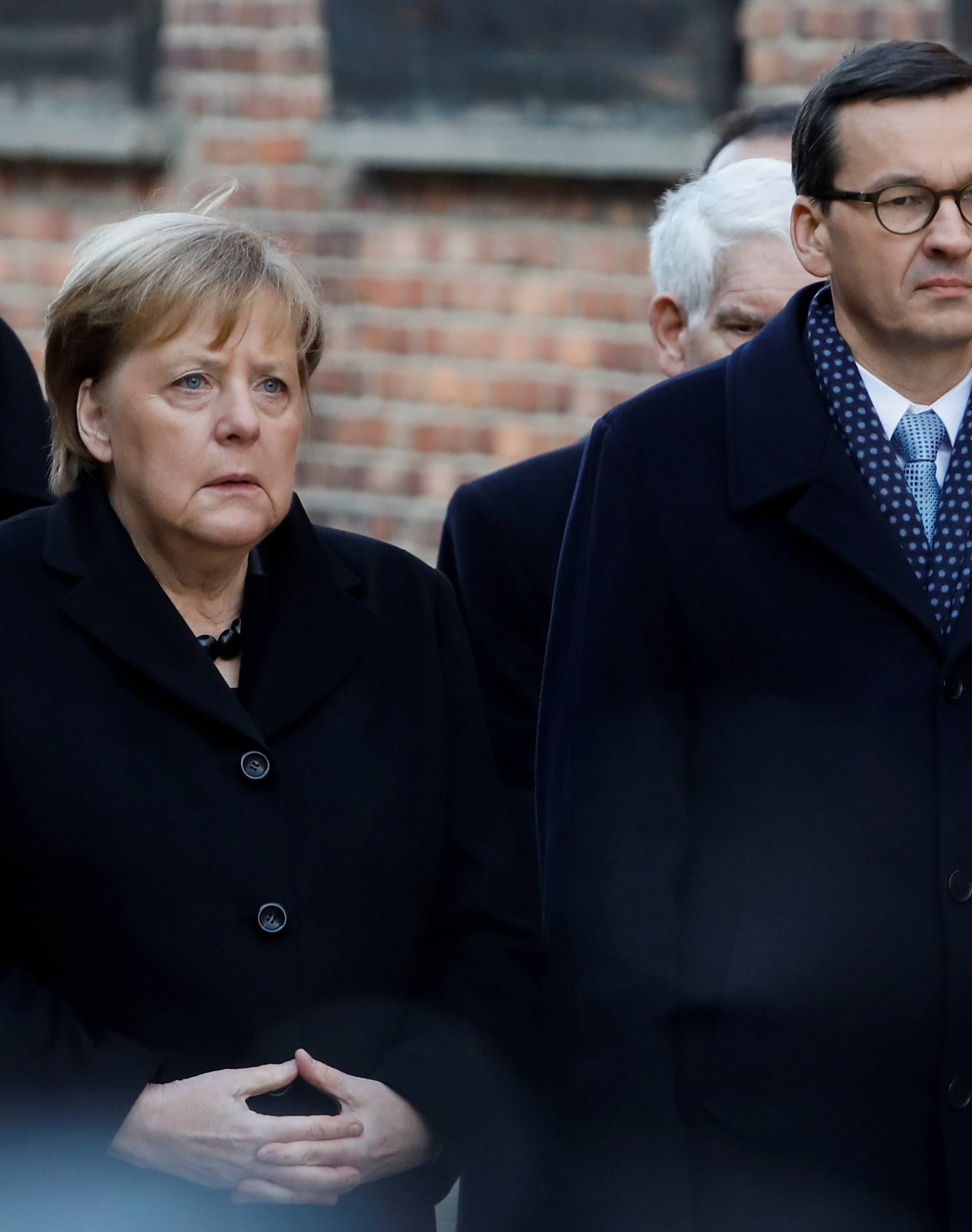 German Chancellor Angela Merkel and Polish Prime Minister Mateusz Morawiecki visit the Auschwitz-Birkenau memorial and museum