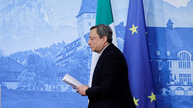 Italian Prime Minister Mario Draghi leaves after addressing the media following the G7 summit