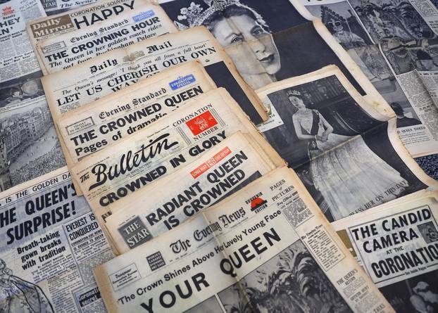 UK newspapers' front pages from Britain's Queen Elizabeth II's Coronation in 1953 are displayed