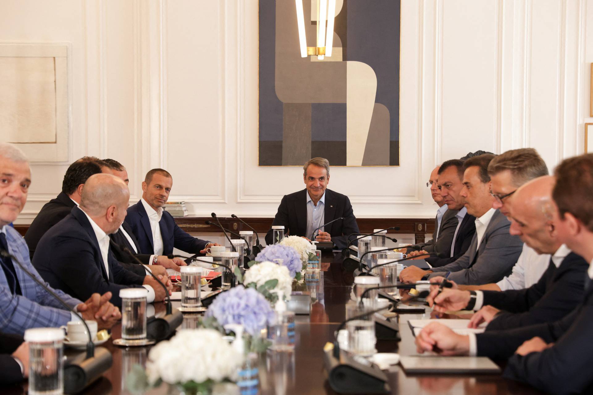 Greek PM Mitsotakis meets with UEFA President Ceferin and owners of Greek soccer clubs at the Maximos Mansion, in Athens