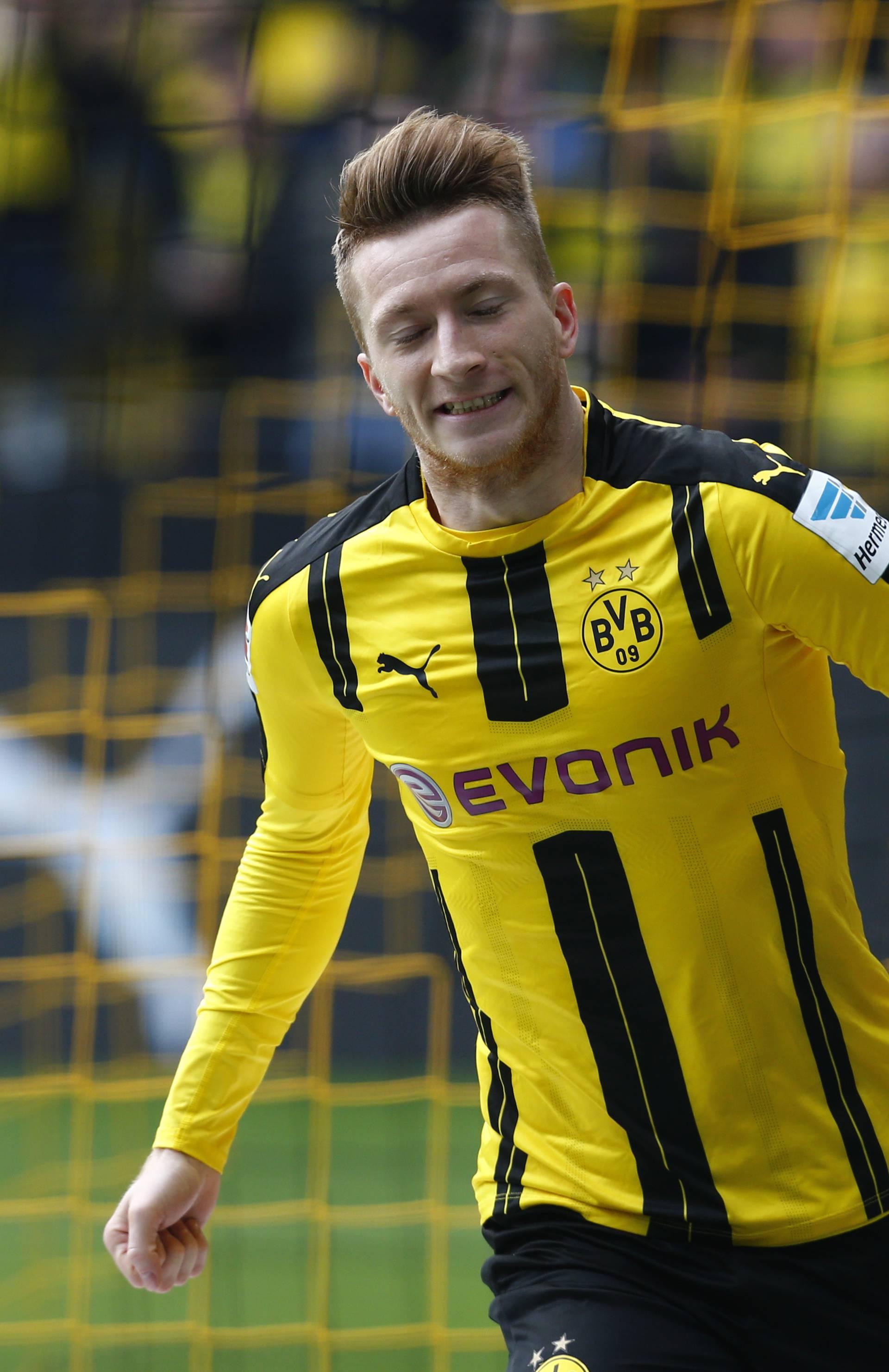 Borussia Dortmund's Marco Reus celebrates scoring their first goal