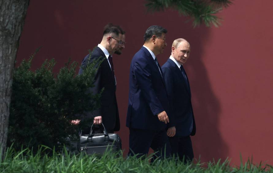 Russian President Vladimir Putin meets with Chinese President Xi Jinping in Beijing