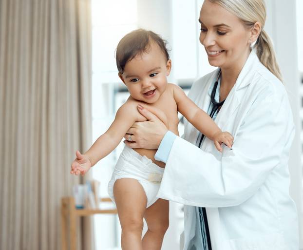 Pediatrician,,Doctor,And,Baby,With,Consultation,,Smile,And,Appointment,For