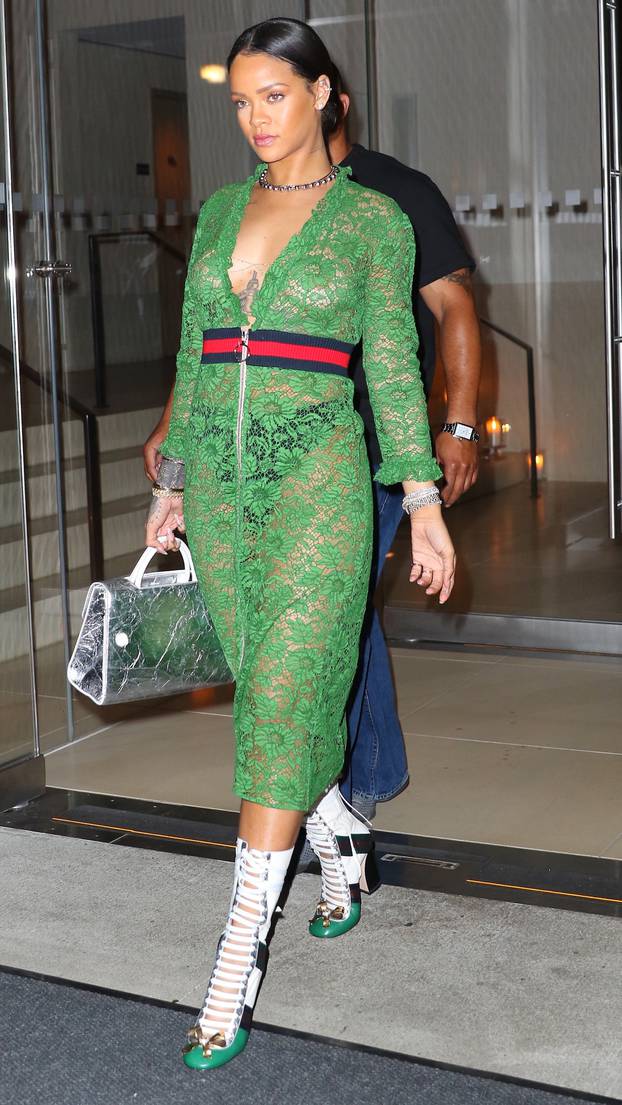 Rihanna is Gucci-down in green lace dress and leather high boots