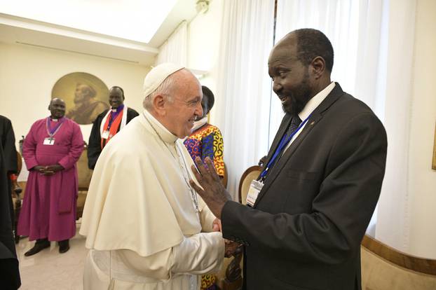 Pope Francis shakes hands with the President of South Sudan Salva Kiir at the end of a two day Spiritual retreat with South Sudan leaders at the Vatican