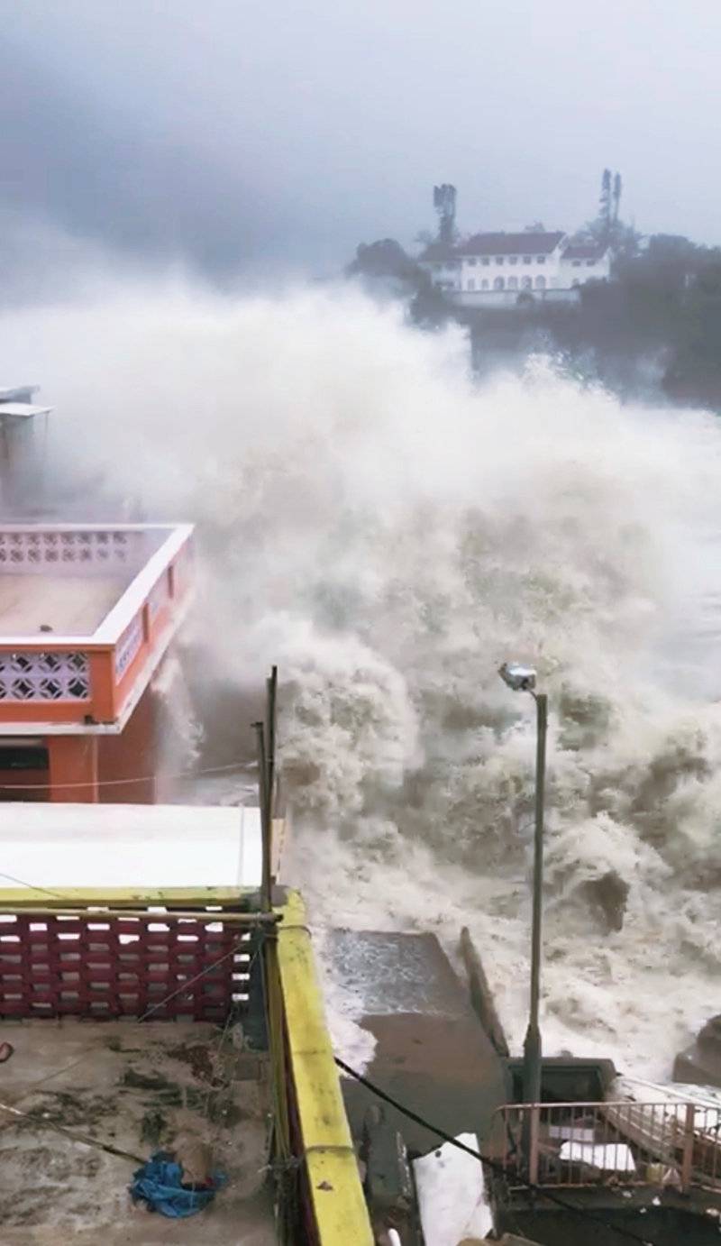 A giant wave strikes the coast in Hong Kong during Typhoon Mangkhut