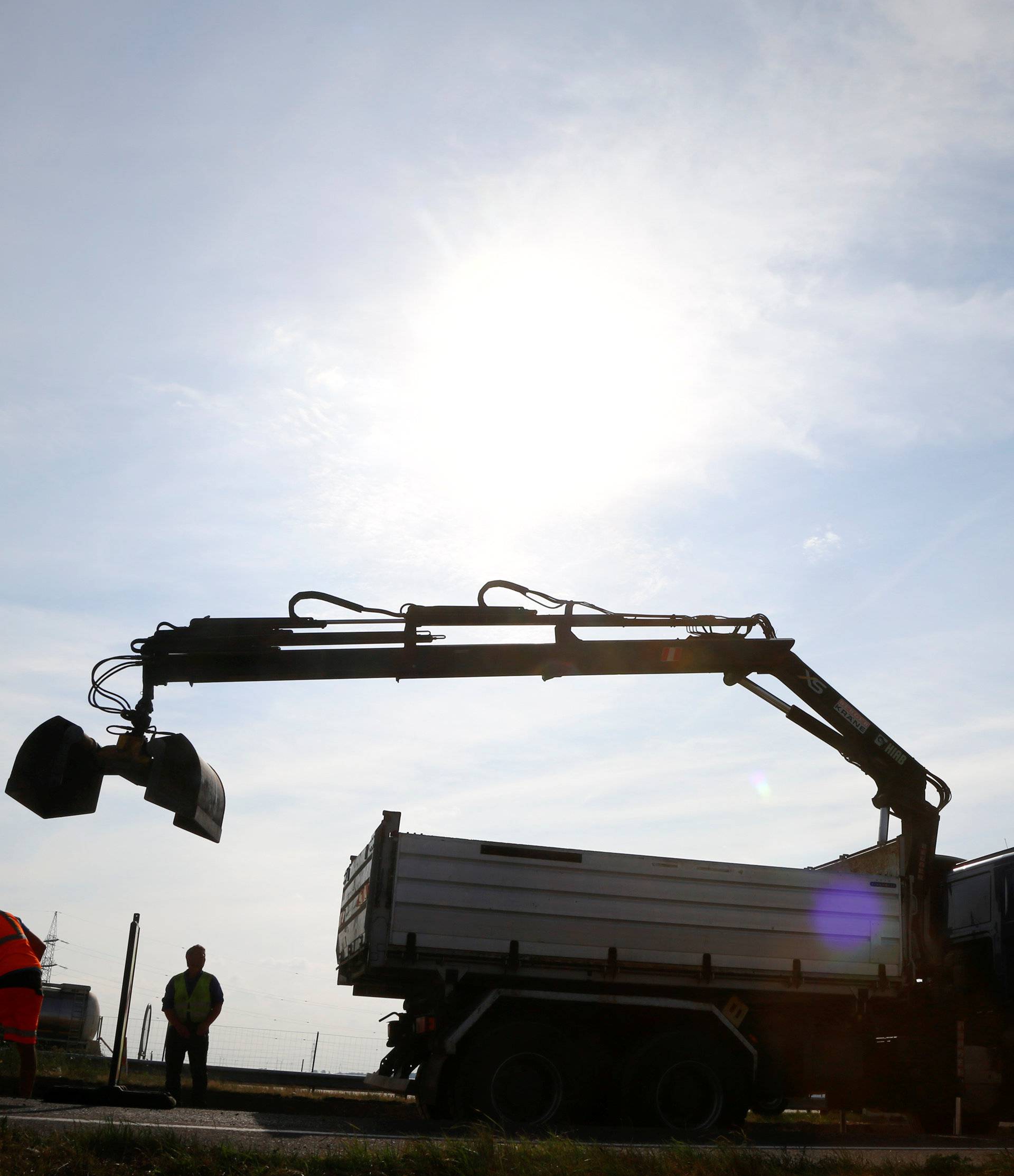 Construction workers are seen at the Austrian-Hungarian border near Nickelsdorf