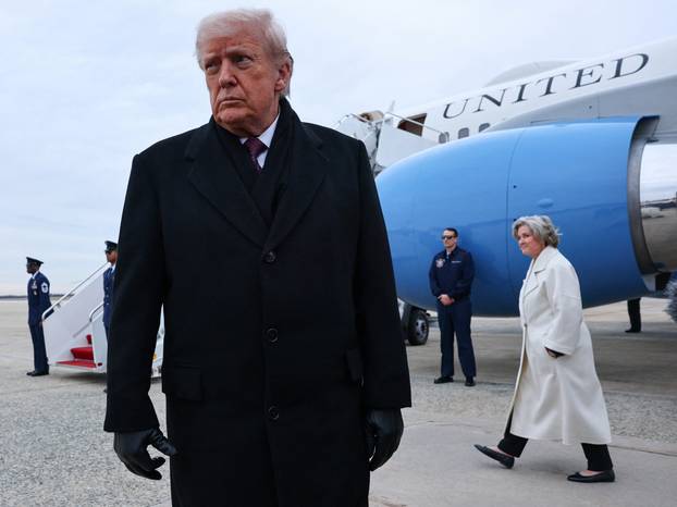 U.S. President Donald Trump disembarks Air Force One as he returns from Delaware, at Joint Base Andrews