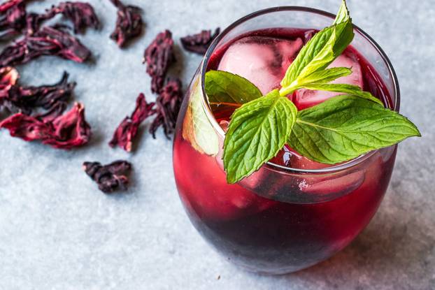 Cold Brew Hibiscus Tea with ice and Mint Leaves.