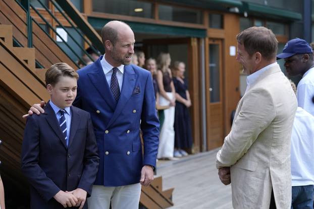 Britain's Prince William and Princess Catherine attend the Wimbledon Tennis Men's finals