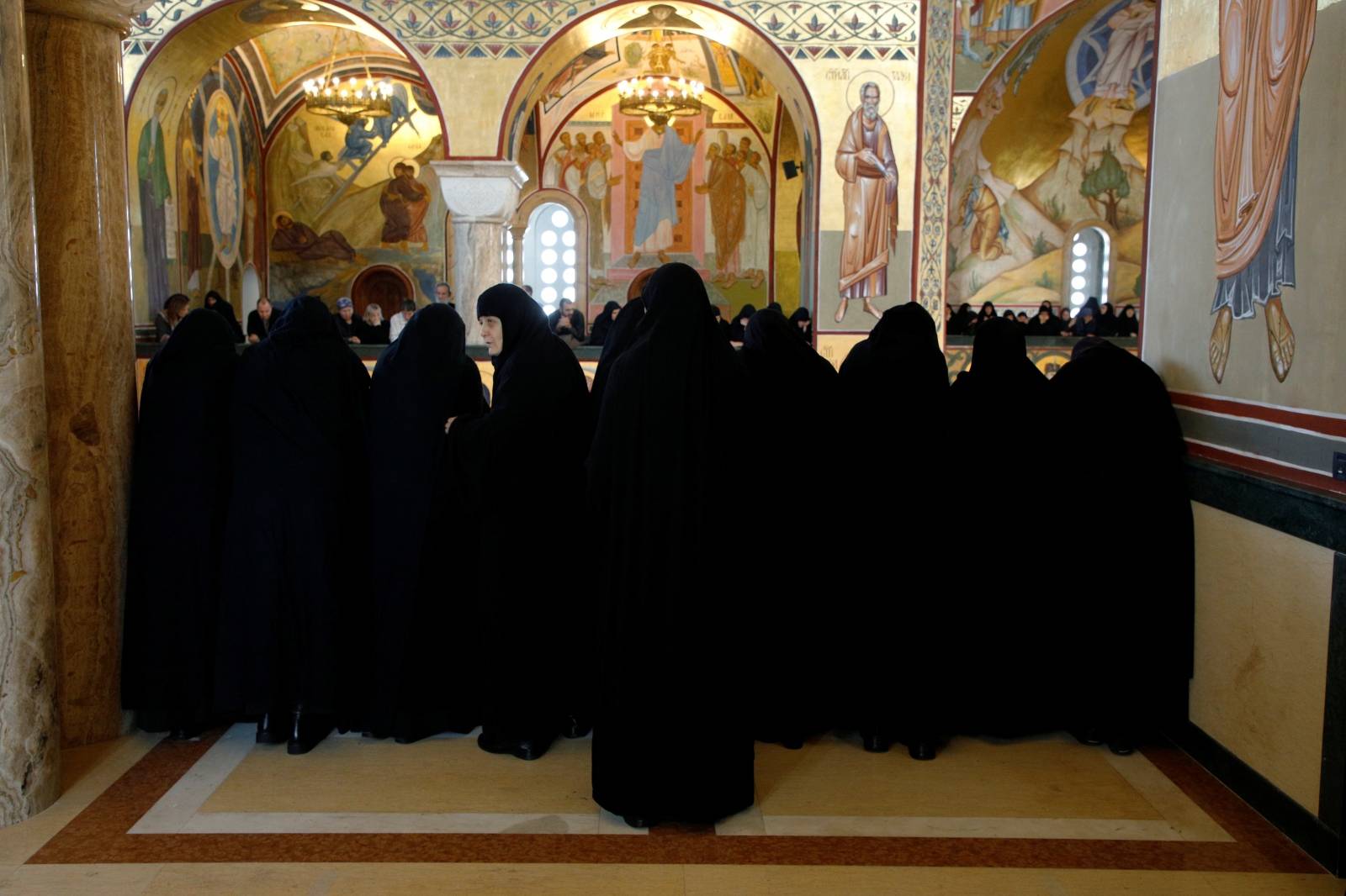 Nuns watch funeral service of late Metropolitan Amfilohije Radovic in Podgorica