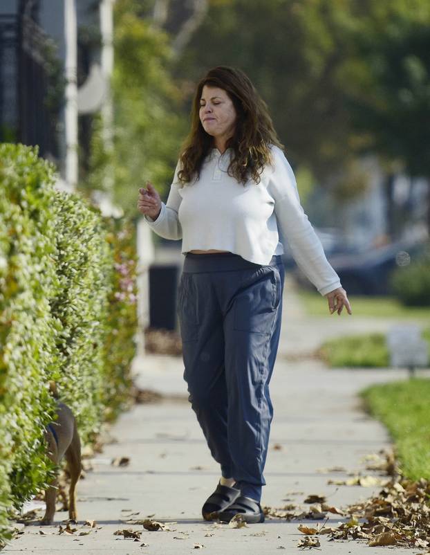 EXCLUSIVE: Yasmine Bleeth is Spotted on a Rare Outing With Husband Paul Cerrito in Los Angeles