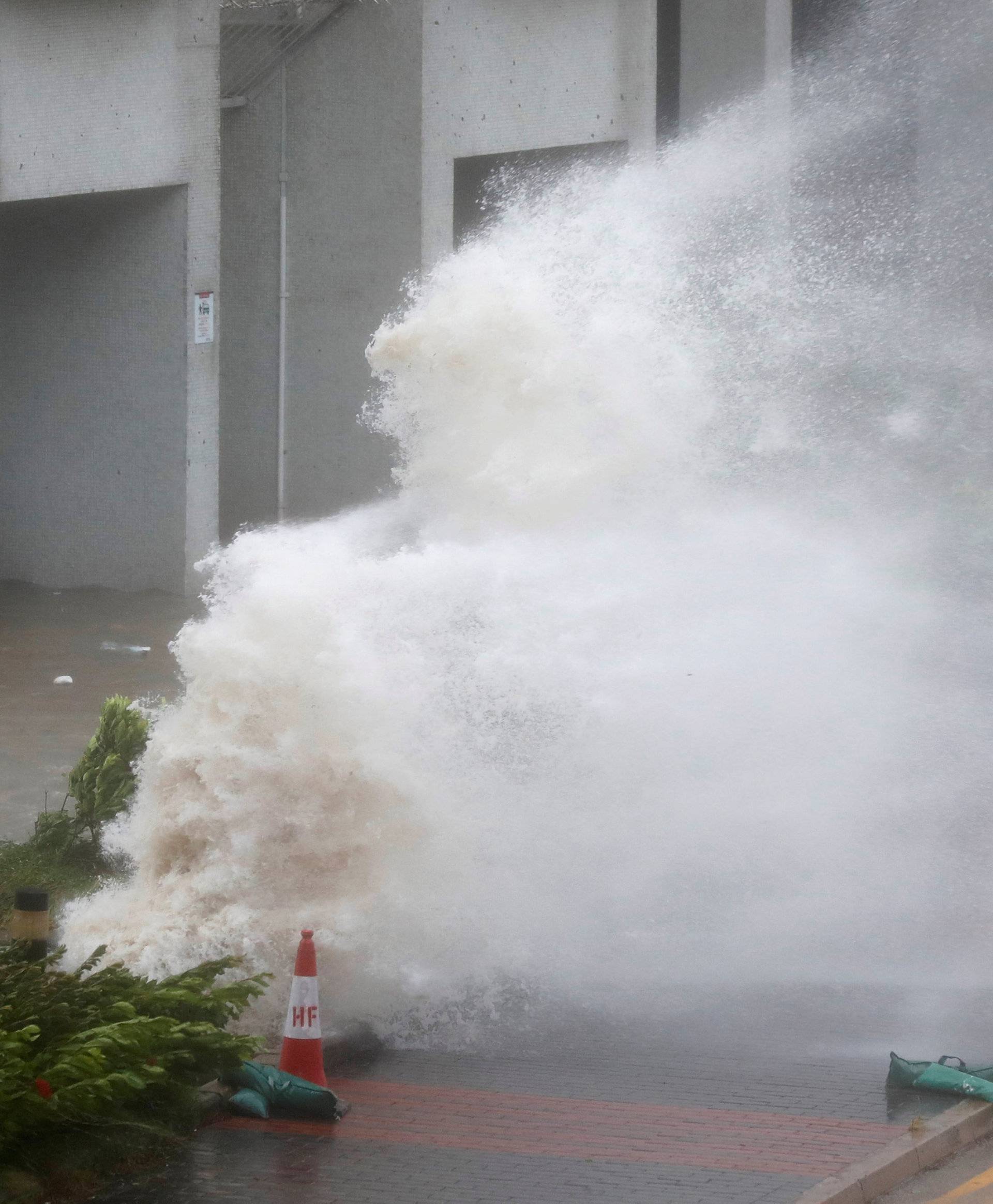 Waves triggered by Typhoon Hato are seen in Hong Kong