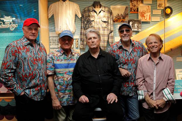 FILE PHOTO: Rock band The Beach Boys pose during the opening night of their special exhibit at the Grammy Museum in Los Angeles