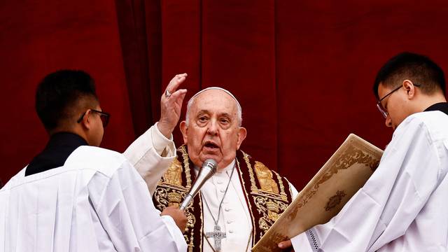 Pope Francis delivers his traditional Christmas Day Urbi et Orbi message at the Vatican