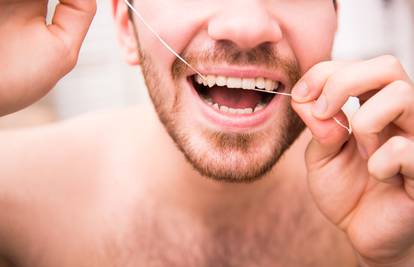 Što se događa u vašim ustima ako ne koristite zubni konac?