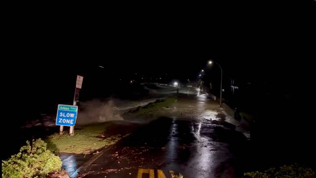 A view shows high tides rising due to Cyclone Gabrielle in Arkles Bay, Auckland