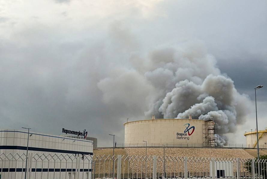 Smoke rises following a strike in Manama