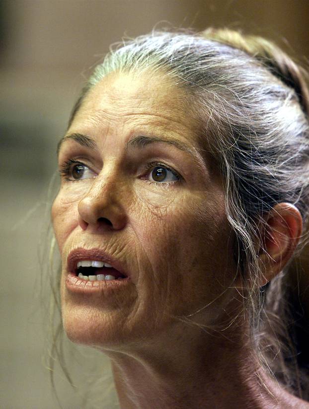 FILE PHOTO: Leslie Van Houten listens during her parole hearing in Corona, California, June 28, 2002. A Californ..