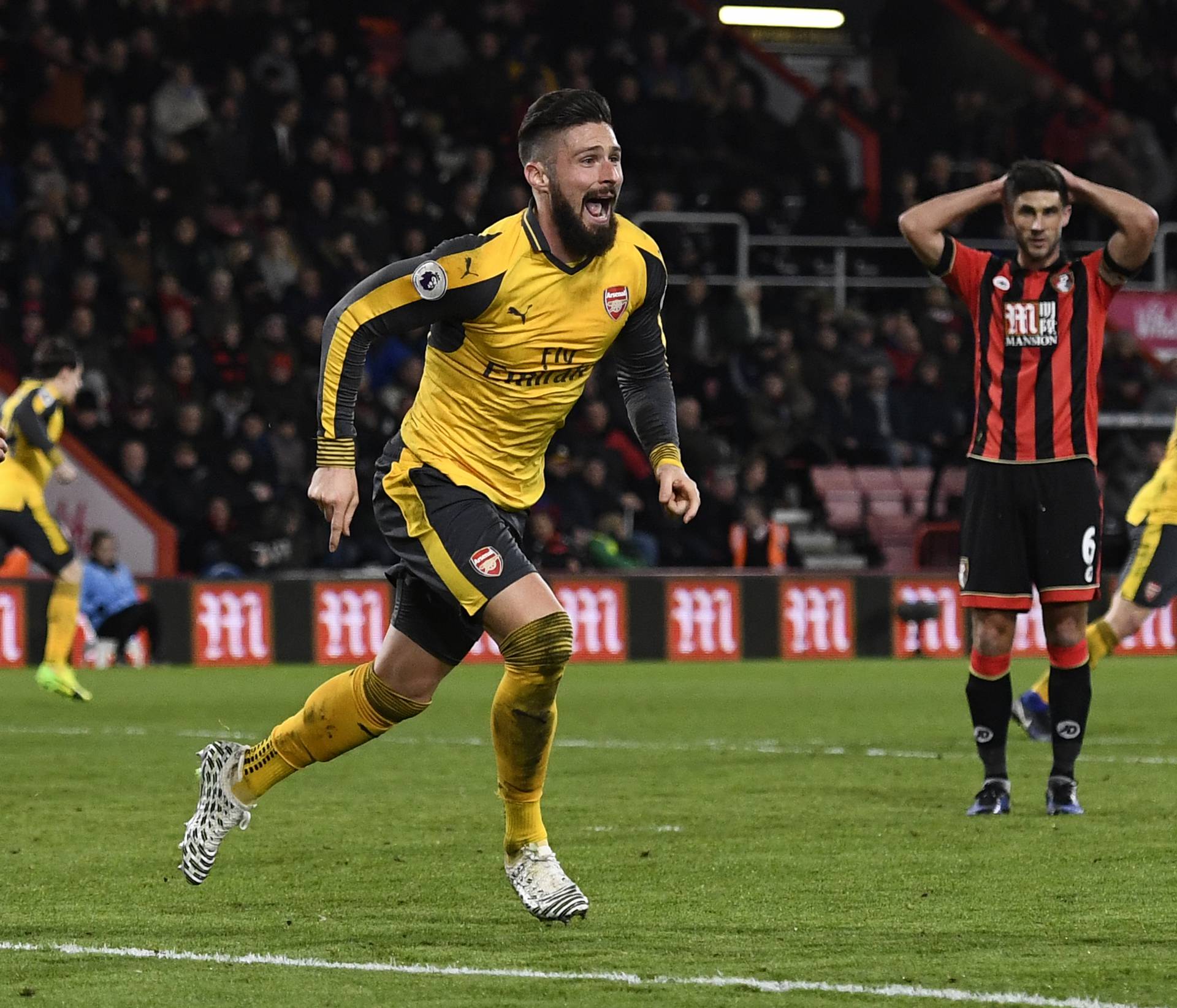 Arsenal's Olivier Giroud celebrates scoring their third goal