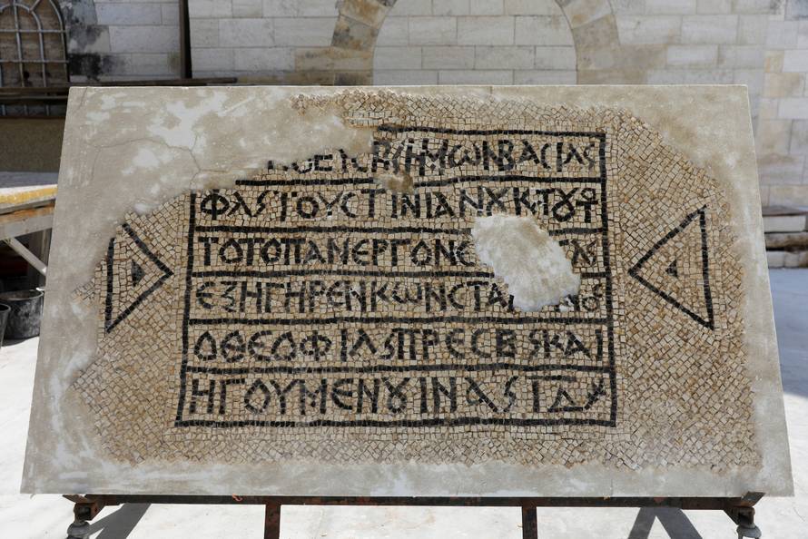 A 1500-year-old mosaic floor bearing a Greek writing, discovered near Damascus Gate in Jerusalem's Old City, is displayed at the Rockefeller Museum in Jerusalem