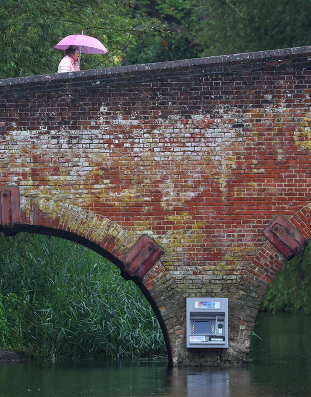 Art installation of an ATM cashpoint, attributed to anonymous artist Impro, on Sonning Bridge in Sonning