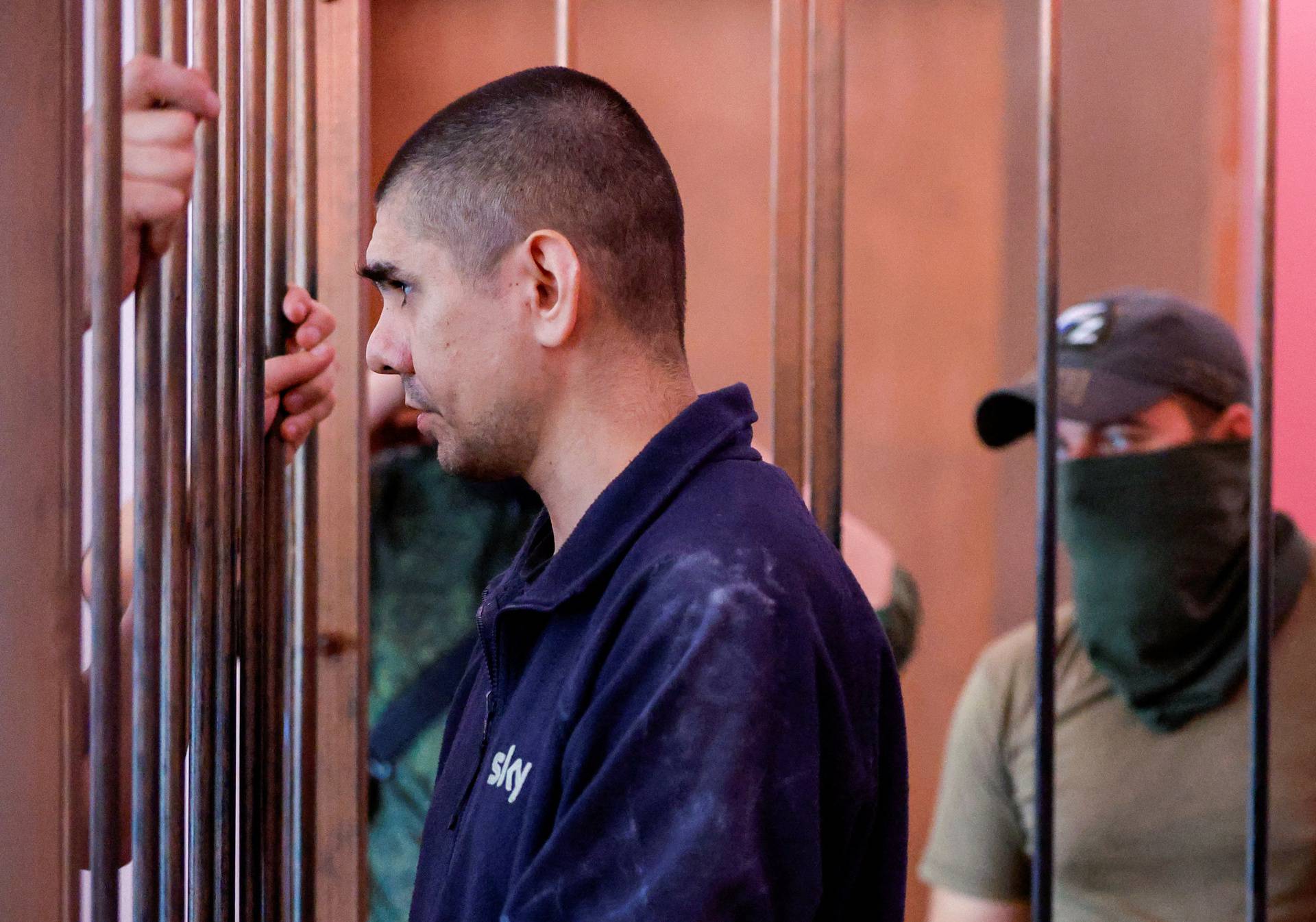 Foreign nationals captured during Ukraine-Russia conflict attend a court hearing in Donetsk