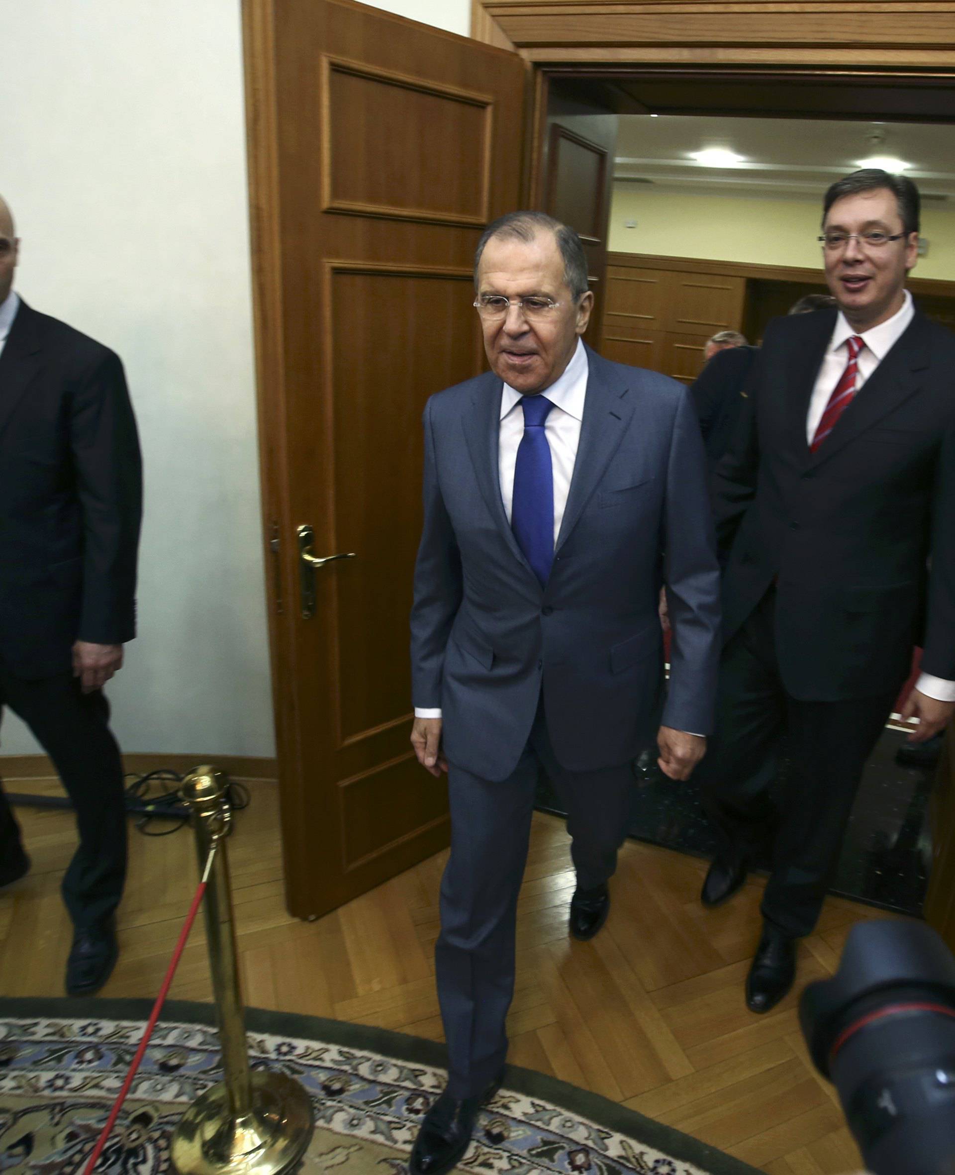 Russia's Foreign Minister Lavrov and Serbia's PM Vucic arrive for their meeting in Belgrade