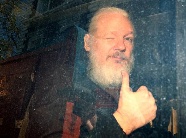 FILE PHOTO: WikiLeaks founder Julian Assange arrives at the Westminster Magistrates Court, after he was arrested  in London
