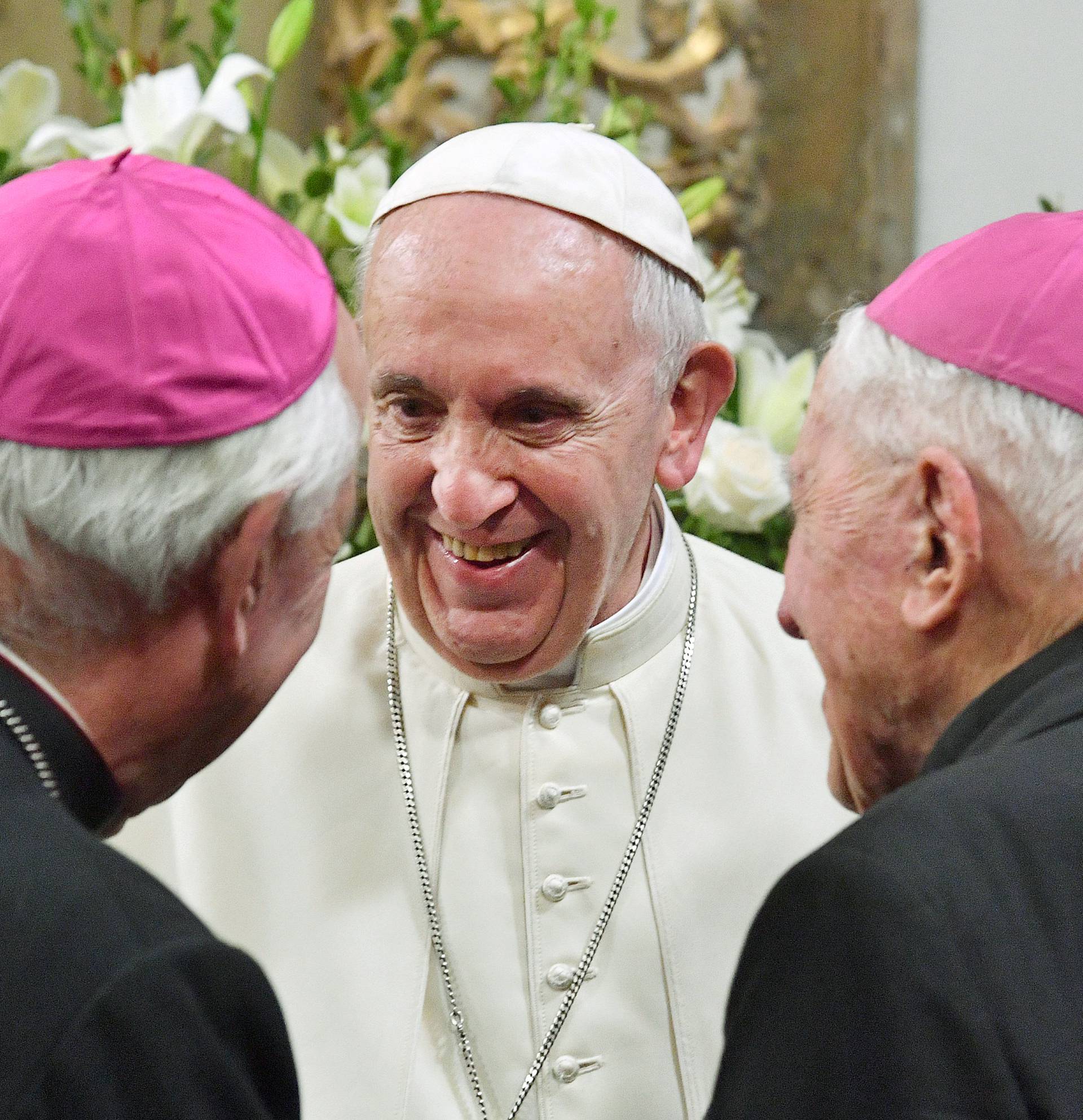 Pope Francis meets with bishops in the sacristy of the Cathedral of Santiago, in Santiago