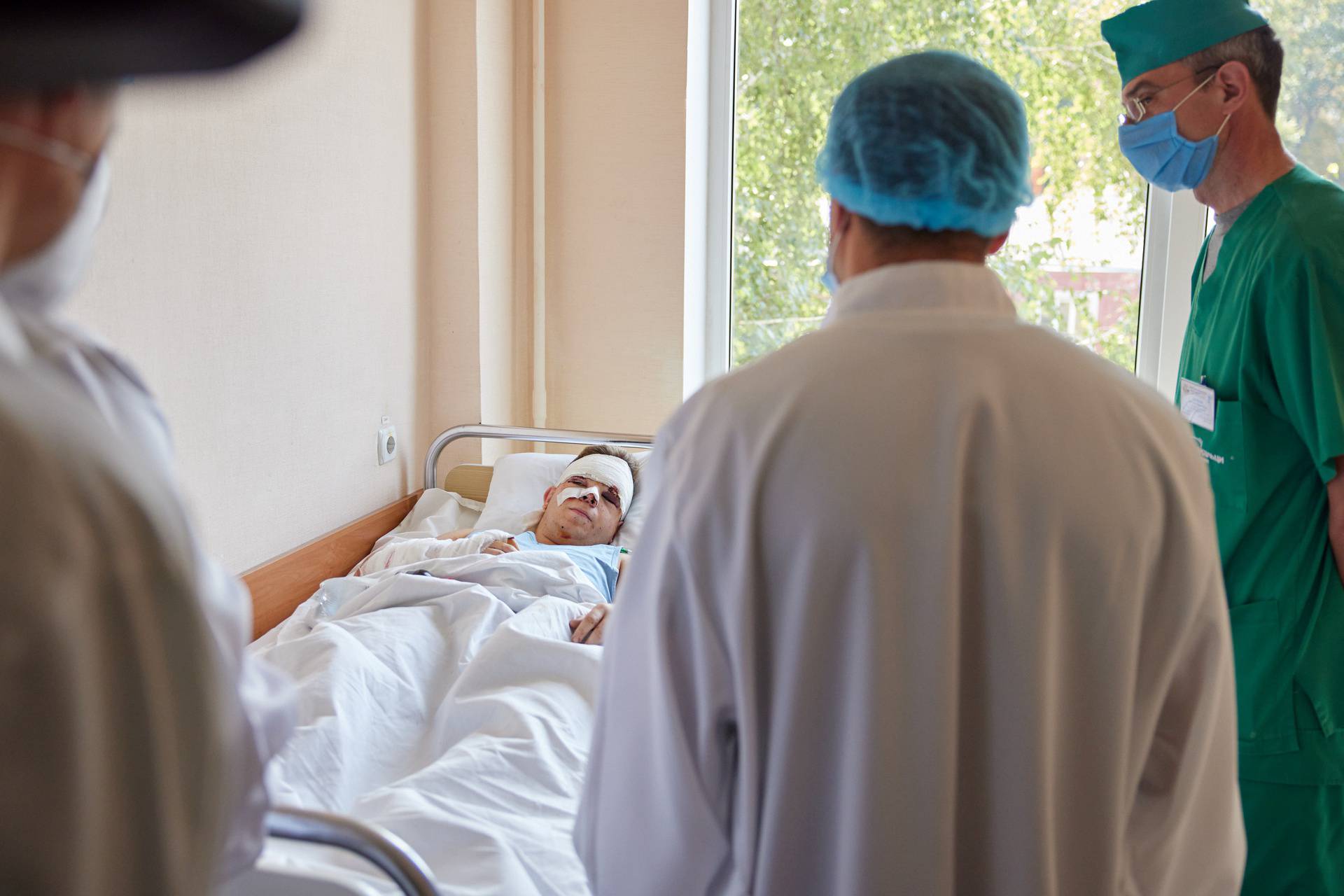 Ukrainian President Zelenskiy visits a military hospital to meet with a cadet who survived the plane crash in Kharkiv