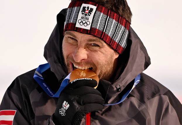 Snowboard - Men's Parallel Giant Slalom Victory Ceremony