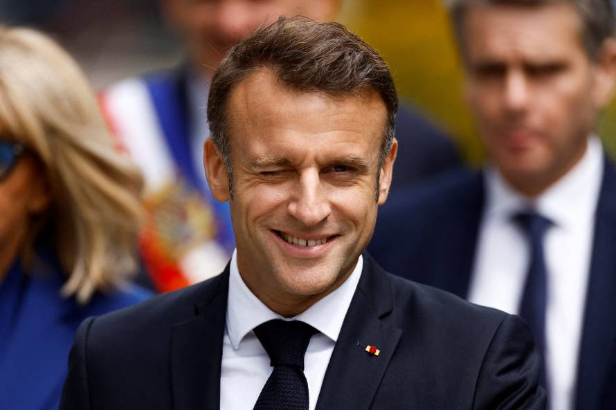 French President Macron votes in the second round of the 2024 snap legislative elections