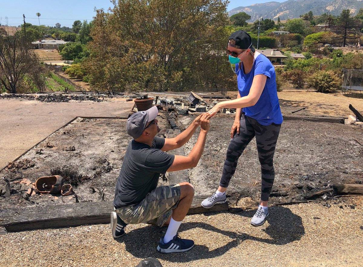 Ishu and Laura Rao, return to the rubble of their home which they lost in a wildfire to retrieve their wedding ring, in Alameda, California