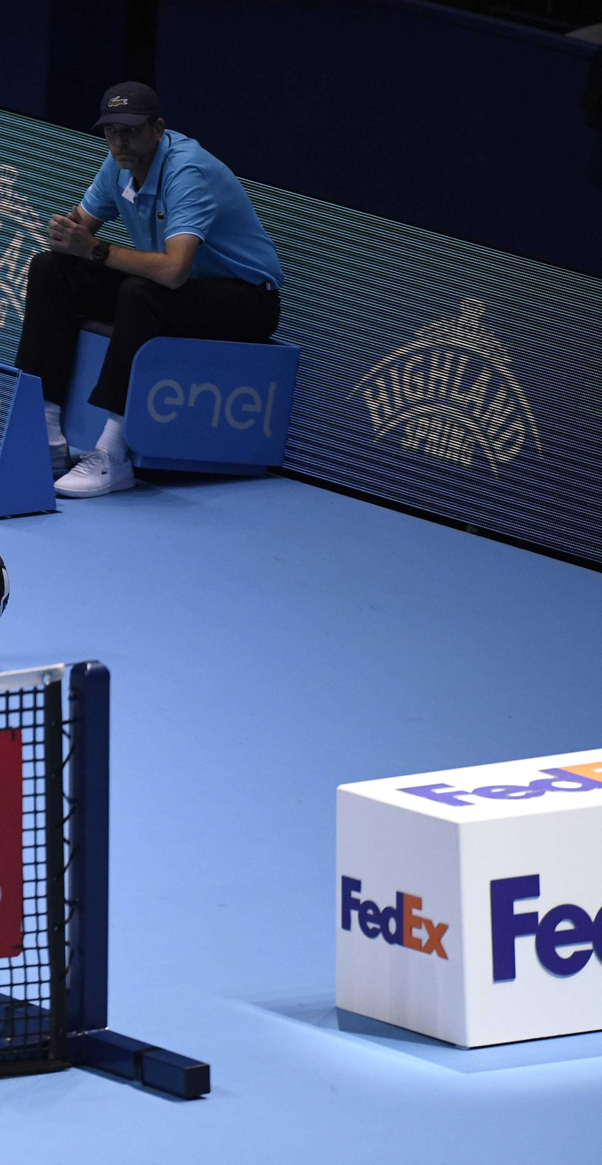 France's Gael Monfils in action during his round robin match with Austria's Dominic Thiem