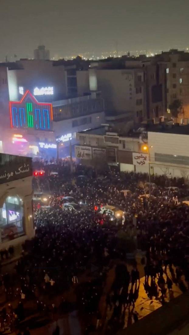 People gather on the streets amid anti-government unrest in Tehran