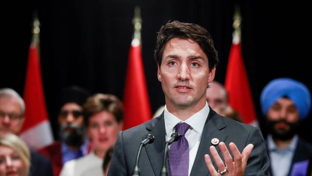 Canada's Prime Minister Justin Trudeau speaks to the media at the end of a two-day cabinet retreat in Calgary