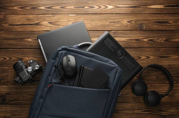 Backpack,With,Photographer,Equipment,And,Gadgets,For,Work,On,A