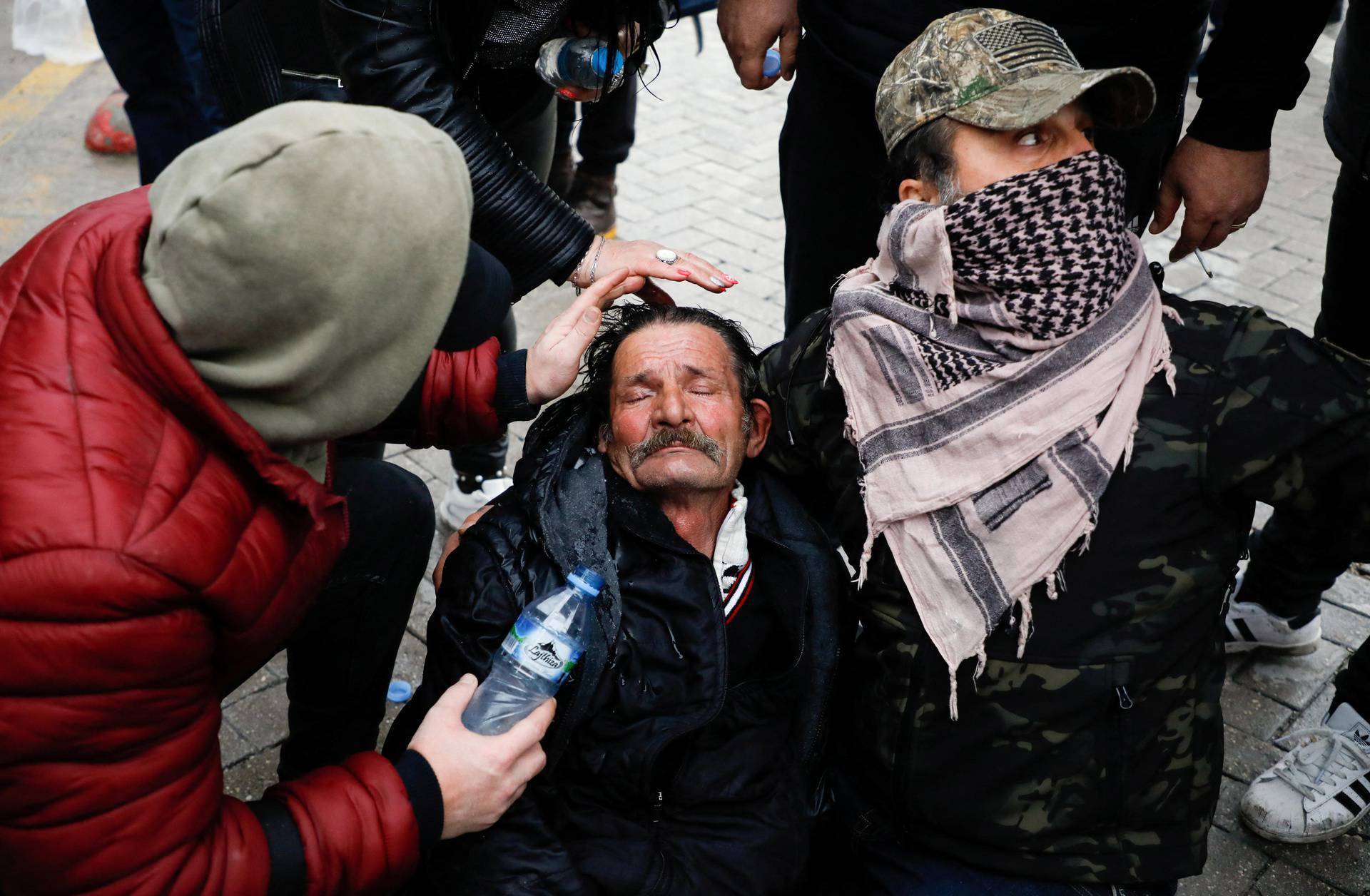 Protesters attack the headquarters of the Democratic Party in Tirana