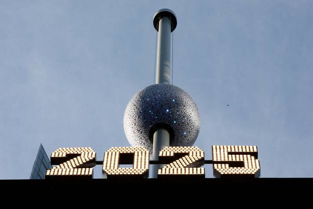 A newly created New Year's eve ball is raised for the first time above One Times Square ahead of the New Year's Eve ball drop in New York