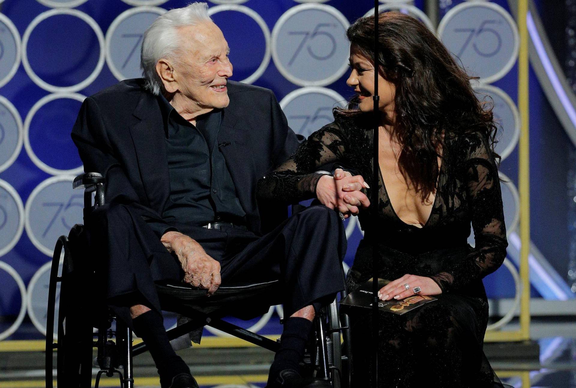 Presenters Kirk Douglas and Catherine Zeta Jones at the 75th Golden Globe Awards in Beverly Hills, California