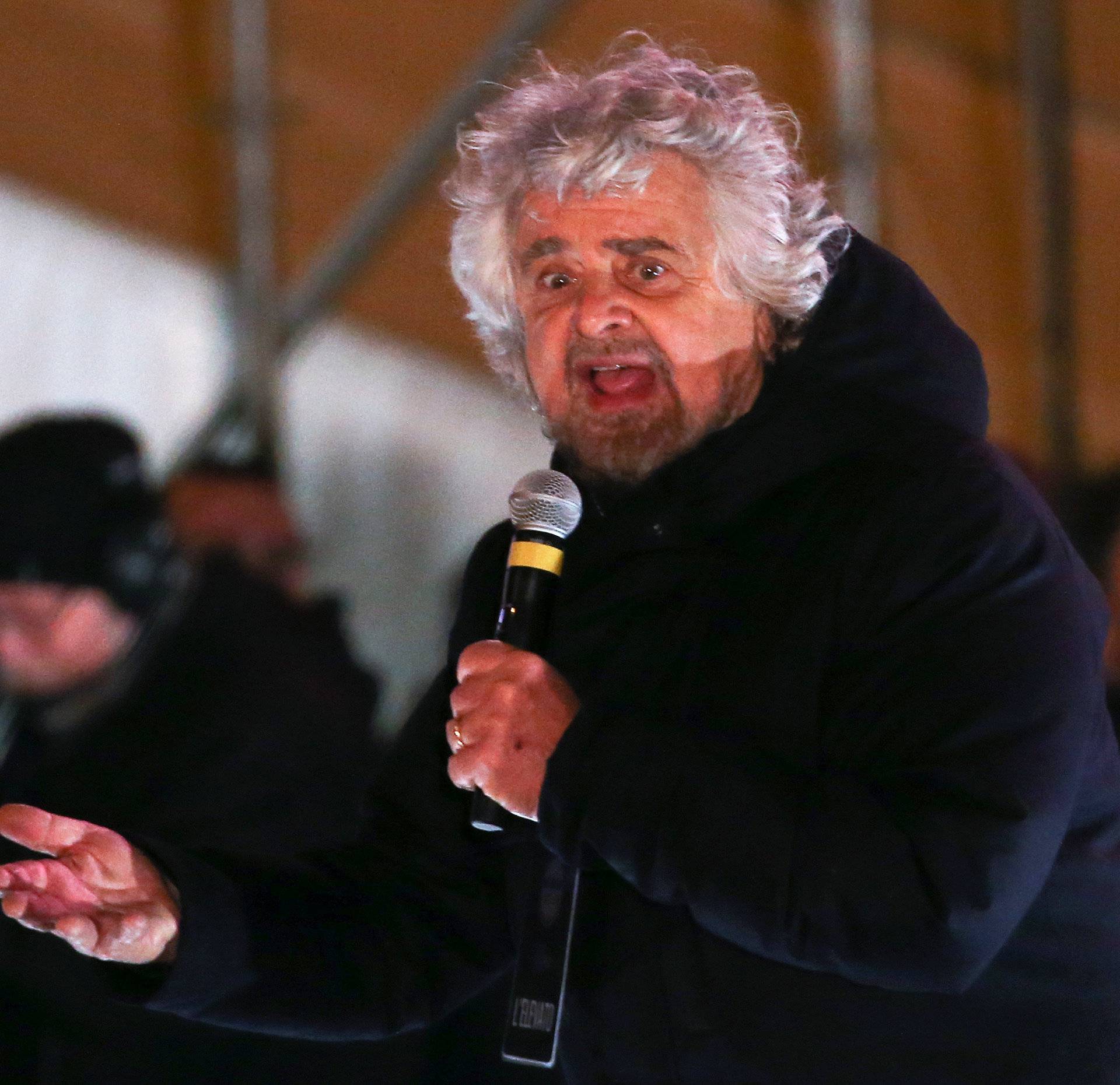 5-Star Movement founder Grillo speaks during the finally rally ahead of the March 4 elections in downtown Rome
