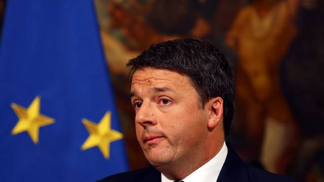 Italian Prime Minister Matteo Renzi looks on during a media conference after a referendum on constitutional reform at Chigi palace in Rome